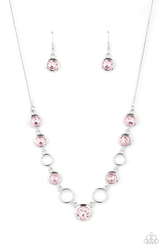 Thick airy silver hoops interlock with round brilliant-cut pink rhinestones set in similar thick frames for an unmatched elegant sparkle. Features an adjustable clasp closure. 
