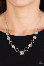 Load image into Gallery viewer, Thick airy silver hoops interlock with round brilliant-cut pink rhinestones set in similar thick frames for an unmatched elegant sparkle. Features an adjustable clasp closure. 

