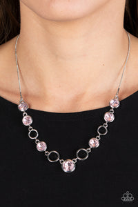 Thick airy silver hoops interlock with round brilliant-cut pink rhinestones set in similar thick frames for an unmatched elegant sparkle. Features an adjustable clasp closure. 