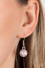 Load image into Gallery viewer, Thick airy silver hoops interlock with round brilliant-cut pink rhinestones set in similar thick frames for an unmatched elegant sparkle. Features an adjustable clasp closure. 
