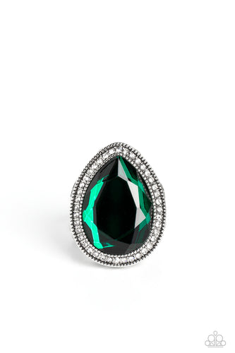 An oversized green teardrop gem is nestled inside a silver teardrop frame encrusted in dainty white rhinestones. Airy teardrop cutouts decorate each side of the oversized frame, some with subtle texture and others with a high sheen finish. Features a stretchy band for a flexible fit.  Sold as one individual ring.