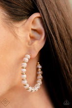 Load image into Gallery viewer, Cloudy, soft peach beads alternate with shiny gold accents along a dainty wire, curling into a timeless hoop in an irresistible pastel palette. Earring attaches to a standard post fitting. Hoop measures approximately 2 1/4&quot; in diameter.  Sold as one pair of hoop earrings.  New Kit Fashion Fix
