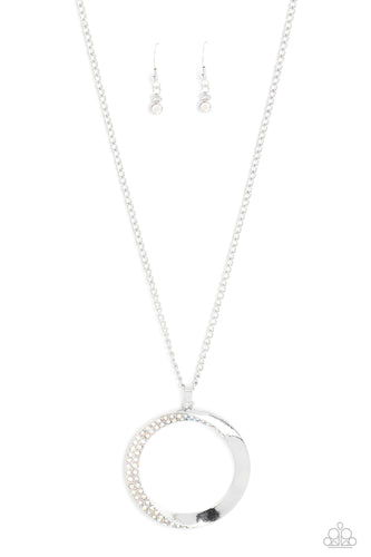 An airy, oversized, warped, shiny silver hoop dangles down the chest from a classic silver chain. Two rows of dainty iridescent rhinestones encrust along the inner curve of the hoop for an understated, elegant dazzle. Features an adjustable clasp closure. 