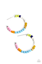 Load image into Gallery viewer, A colorful strand of green, royal blue, white, reflective yellow, gold, blue, orange, and pink seed beads follow the curve of a silver hoop, creating a colorfully charismatic look. Earring attaches to a standard post fitting. Hoop measures approximately 1 1/4&quot; in diameter. 
