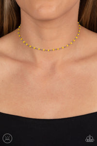 Dainty silver beads and square Samoan Sun beads delicately link around the neck, creating a minimalist inspired bright pop of color. Features an adjustable clasp closure.