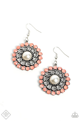 A white pearl is encircled by a border of exaggerated silver chain links, which then give way to an outer ring of milky Peach Pink beads. As the circular frame swings from the ear, the faceted edges of the beads catch the light, emanating a youthful glow. Earring attaches to a standard fishhook fitting.  Sold as one pair of earrings.