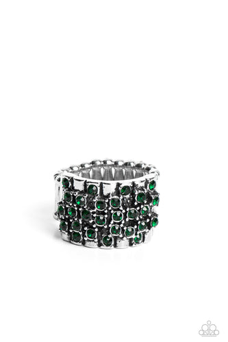 Layers of linear silver textures are accented with an explosion of dainty, emerald rhinestones, adding a touch of glam to the gritty design. Dainty duos of the green rhinestones layer next to the edgy silver layers for additional sparkle. Features a stretchy band for a flexible fit. 