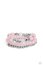 Load image into Gallery viewer, Varying in shape and size, shiny silver beads, silver cube beads, silver accents, baby pink opaque beads, and reflective crystal-like beads are threaded along elastic stretchy bands, creating colorful layers across the wrist.
