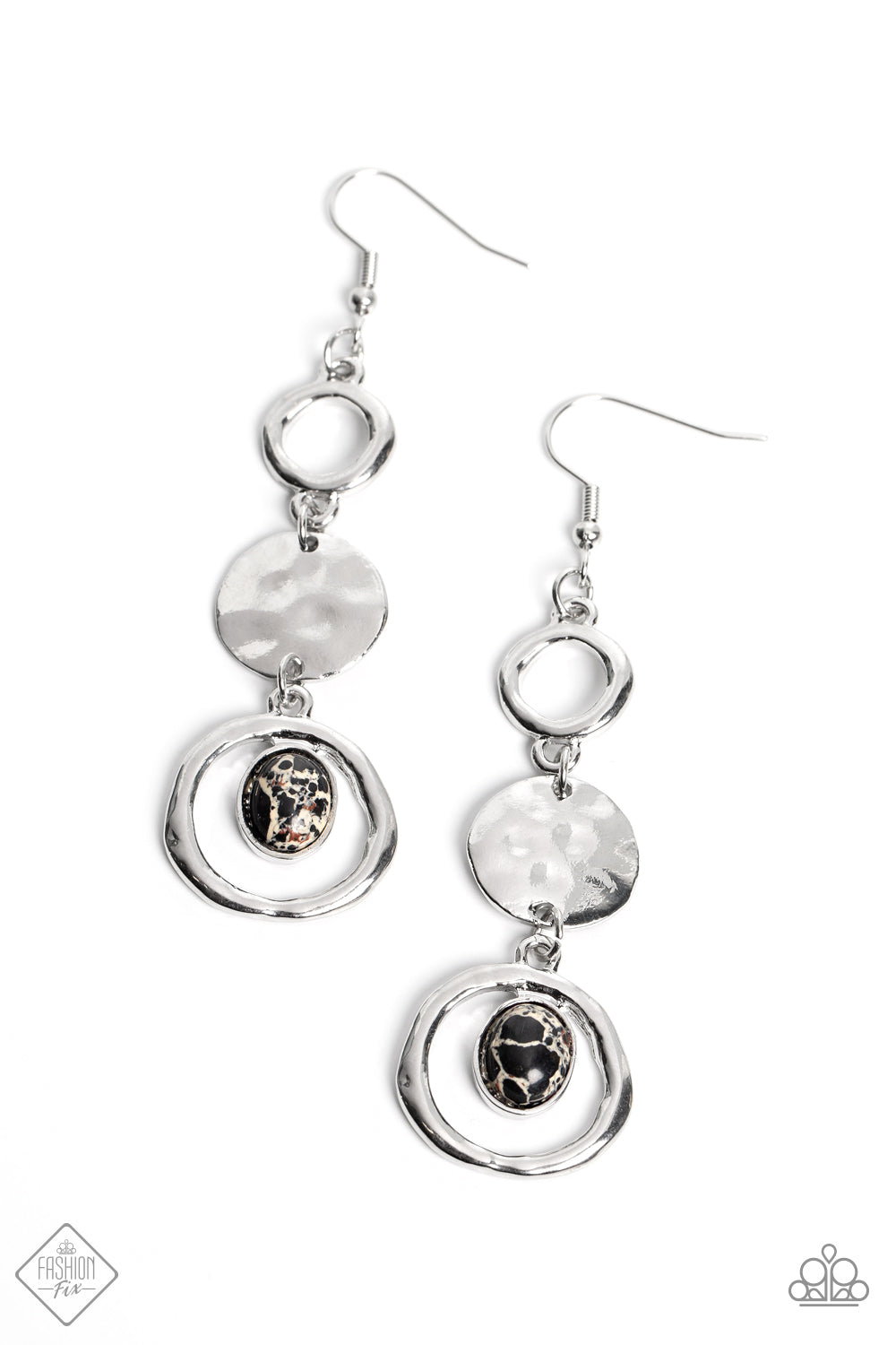 A classic silver hoop gives way to a shimmery silver disc that is hammered in rippling textures. Below the high-sheen disc, a marbled black stone, wrapped in a thin silver border, is affixed to the top of a warped silver frame, completing the cascade of artisanal accents. Earring attaches to a standard fishhook fitting. As the stone elements in this piece are natural, some color variation is normal.  Sold as one pair of earrings.
