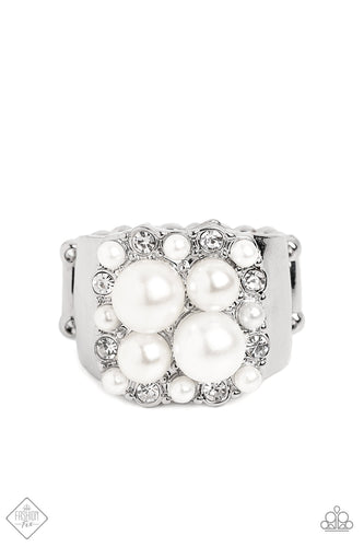 Infused into a high-sheen band of silver, a dreamy collection of classic white pearls in varying sizes mingles with gleaming white gems for dimension and depth atop the finger, resulting in a standout centerpiece. Features a stretchy band for a flexible fit.  Sold as one individual ring.  New Kit Fashion Fix