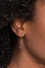 Load image into Gallery viewer, Featuring smoldering marquise style cuts, oversized smoky gems fan out from an interconnected, circular smoky rhinestone display. Separating the dauntless florals, airy brass ovals, stamped with a dot motif, create additional eye-catching sheen. Features an adjustable clasp closure.
