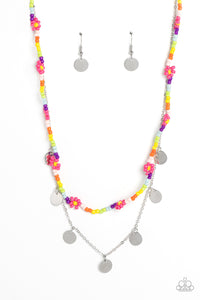 Multicolored seed beads are threaded along a wire, falling along the collar in a capricious pattern. Creating additional charm to the design, Pink Peacock seed bead flowers bloom amongst the bright pops of color. A delicate silver chain, infused with twinkling silver discs, layers with the colorful beads for a sassy, yet sweet, combo. Features an adjustable clasp closure. 