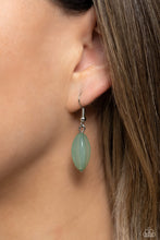 Load image into Gallery viewer, Shiny silver cubed accents, cloudy, milky, green oval beads and milky peach beads coalesce down the neckline on invisible wires, creating a trio of colorful layers. Features an adjustable clasp closure.
