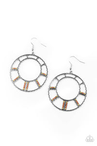 Stacks of dainty Rust and Willow beads flare out from a textured silver frame, creating a colorful sunburst pattern. Earring attaches to a standard fishhook fitting.  Sold as one pair of earrings.