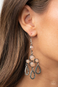 A cluster of bubbly Desert Mist opaque beaded frames give way to hammered silver teardrops, creating a mystical fringe. Earring attaches to a standard fishhook fitting.  Sold as one pair of earrings.