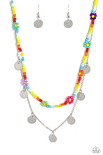 Load image into Gallery viewer, Multicolored seed beads are threaded along a wire, falling along the collar in a capricious pattern. Creating additional charm to the design, Pink Peacock, white, purple, blue, orange, green, purple, and baby pink seed bead flowers bloom amongst the bright pops of color. A delicate silver chain, infused with twinkling silver discs, layers with the colorful beads for a sassy, yet sweet, combo. Features an adjustable clasp closure.
