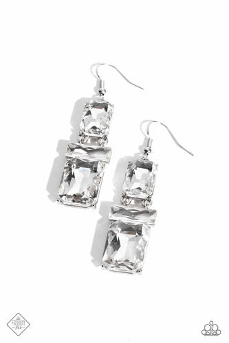 Two oversized emerald-cut gems sparkle unapologetically, increasing in size as they fall from the ear. A white gem bar, featuring sharp faceted surfaces, lays perpendicular to the blinding emerald-cut gems, separating the two and emphasizing their hinged movement. Earring attaches to a standard fishhook fitting.  Sold as one pair of post earrings.