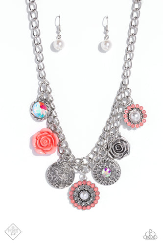 A collection of whimsical botanical charms gathers along a flat, silver, double-curbed chain. The featured charms include a Peach Pink resin flower, a metallic rose, a silver disc stamped with a paisley motif, an oversized, faceted orange iridescent gem bordered in textured silver, an iridescent gem encompassed by alternating chains, and a pearl-centered flower with Peach Pink gem petals, creating a floral fantasy. Features an adjustable clasp closure. Due to its prismatic palette, color may var
