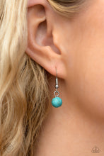 Load image into Gallery viewer, A collection of turquoise stones and white opalescent beads are featured in a range of pronged silver fittings and floral patterns, falling along the neckline in an artisanal display. The haphazard placement of each element further emphasizes their handcrafted charm, as the opalescent beads bring a hint of shimmer to the design. Features an adjustable clasp closure. As the stone elements in this piece are natural, some color variation is normal.
