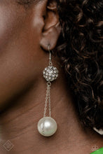 Load image into Gallery viewer, An oversized lustrous white pearl is suspended from two dainty silver chains that delicately sway from an airy silver sphere, adorned in sparkling white gems for a classy dance of elegance at the ear. Earring attaches to a standard fishhook fitting.  Sold as one pair of earrings.
