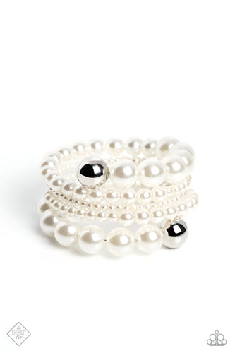 Varying sizes of lustrous pearls are threaded along a wire that curves and spins around the wrist, creating an elegant infinity wrap style bracelet. Reflective silver beads border the ends of the pearly display for additional sheen and glitz.  Sold as one individual bracelet.