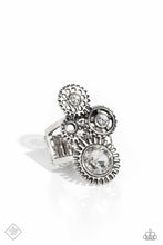 Load image into Gallery viewer, Centered atop a pair of arcing silver bands, four gear pendants with varying textures, details, sizes, and a dusting of gems climb up the finger for a steampunk-styled centerpiece. Features a stretchy band for a flexible fit.  Sold as one individual ring.
