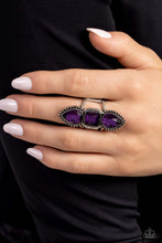 Load image into Gallery viewer, Featuring square and teardrop cuts, vivacious purple gems are pressed into a studded and sleek silver frame, creating a stacked, grand display atop the finger. Airy silver bands anchor the blinding bling to the finger for additional whimsical detail. Features a stretchy band for a flexible fit. 
