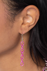 A sleek silver link chain swings from the middle of a display of mismatched dainty pink chains, creating an edgy layered display. Features an adjustable clasp closure. 
