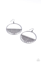 Load image into Gallery viewer, A curtain of white rhinestones is stretched between the edges of a skinny, oversized gunmetal hoop, creating a shimmering display. The rhinestones taper towards the center as they sway and cascade, adding sparkly movement for a fierce industrial finish. Earring attaches to a standard fishhook fitting. 
