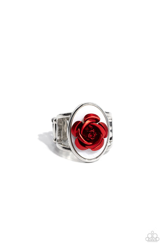 Featuring a white shell backdrop, high-sheen red petals fan out from the center of the oval display, creating a regal rose atop airy silver bands on the finger. Features a stretchy band for a flexible fit. 