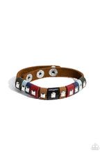 Load image into Gallery viewer, Sections of green, blue, red, brown, and black leather wrap around an urban brown leather band. Emerald-cut silver frames stud the centers of each multicolored suede band, adding a touch of industrial grit to the rustic display. Features an adjustable snap closure. 
