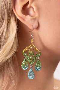 Three rhinestone-encrusted teardrops drip from the bottom of an ornate decorative frame, creating an elegant fringe. The decorative frame swirls with ombré rhinestones that go from yellow to green to blue shades in varying sizes for a timelessly over-the-top sparkle. Earring attaches to a standard fishhook fitting. 