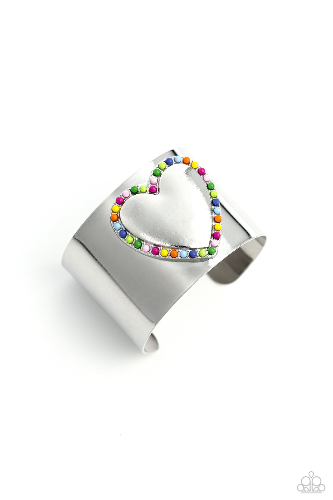 Featuring Rose Violet, light pink, Classic Green, Kohlrabi, Persian Jewel, Summer Song, High Visibility, red, and orange beads, the center of a thick silver cuff swoops and curls into a charming heart, creating a retro-inspired fashion.