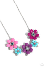 Load image into Gallery viewer, Dotted with dainty Harbor Blue, aquamarine, and rose rhinestone centers, dainty silver flowers bloom against a backdrop of glossy acrylic flowers in Aurora Pink, Rose Violet, Cattleya Orchid, and Spun Sugar hues. Each flower, varying in size, blossoms across a textured collection of silver leaves below the collar, invoking a festive spirit. Features an adjustable clasp closure.
