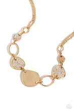 Load image into Gallery viewer, A shiny series of asymmetrical, concaved gold discs, some embossed in white rhinestones, alternate with airy gold frames as they delicately increase in size and link below the collar, creating an artisanal-inspired statement. Features an adjustable clasp closure. 
