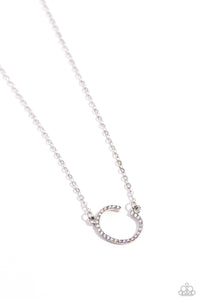 Embossed with dainty iridescent rhinestones, a silver letter "C" hovers below the collar from a dainty silver chain, for a sentimentally simple design. Features an adjustable clasp closure. Due to its prismatic palette, color may vary. 