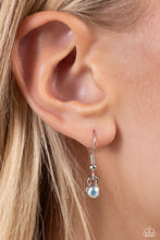 Load image into Gallery viewer, Embossed with dainty iridescent rhinestones, a silver letter &quot;J&quot; hovers below the collar from a dainty silver chain, for a sentimentally simple design. Features an adjustable clasp closure. Due to its prismatic palette, color may vary.
