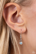 Load image into Gallery viewer, Embossed with dainty iridescent rhinestones, a silver letter &quot;L&quot; hovers below the collar from a dainty silver chain, for a sentimentally simple design. Features an adjustable clasp closure. Due to its prismatic palette, color may vary. 
