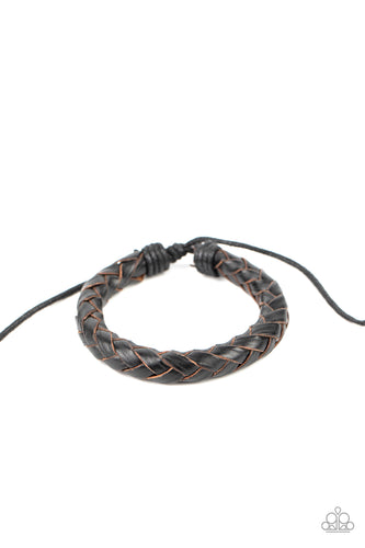 Rustically braided leather laces delicately spin into a boldly woven band around the wrist. Features an adjustable sliding knot closure.