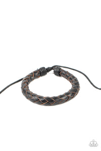 Rustically braided leather laces delicately spin into a boldly woven band around the wrist. Features an adjustable sliding knot closure.