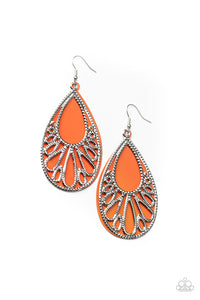 Stenciled with studded filigree, an airy silver teardrop overlaps atop an orange acrylic teardrop frame, creating a flamboyant lure. Earring attaches to a standard fishhook fitting.