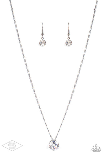 A single rhinestone sparkles brilliantly at the bottom of a dainty gunmetal chain, creating a stunning solitaire design.  Features an adjustable clasp closure.