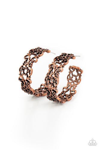 Brushed in an antiqued shimmer, studded vine-like filigree climbs into a whimsical copper hoop for a seasonal flair. Earring attaches to a standard post fitting. Hoop measures approximately 1 1/2