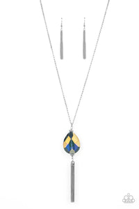 Infused with a glistening silver chain tassel, an oversized purple UV teardrop gem swings from the bottom of a lengthened silver chain for a glamorously glitzy finish. Features an adjustable clasp closure.  Sold as one individual necklace. Includes one pair of matching earrings.
