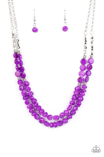 Infused with dainty silver cube and round beaded accents, purple shell-like beads are threaded along invisible wires below the collar for a summery inspiration. Features an adjustable clasp closure.