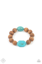 Load image into Gallery viewer, Oversized brown wooden beads and mismatched turquoise stone accents are separated by dainty silver discs and threaded along a stretchy band, creating an earthy centerpiece around the wrist.  Sold as one individual bracelet.  New Kit Fashion Fix
