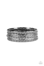 Load image into Gallery viewer, Embossed in slanted ribbons of textured and studded hammered patterns, trios of mismatched gunmetal bangles stack across the wrist for an intense industrial vibe.  Sold as one set of six bracelets.
