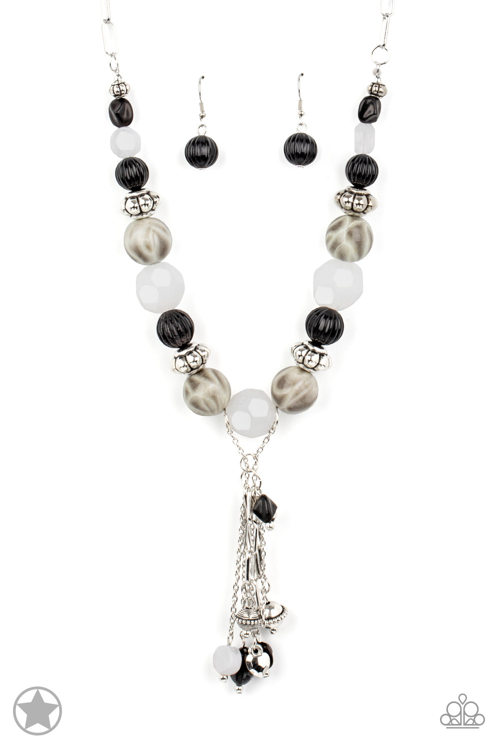 Smooth beads with a marbleized black and white swirl alternate with milky white and silver accents. A tassel of chains in various lengths is decorated with black, silver, and frosty pieces. Features an adjustable clasp closure.  Sold as one individual necklace. Includes one pair of matching earrings.   Get The Complete Look! Bracelet: 