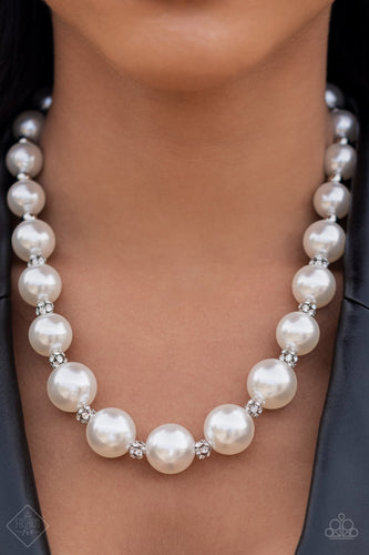 Brilliant white rhinestone clusters and shiny silver beads accent a strand of lusciously oversized pearls, creating a stylish display below the collar. Features an adjustable clasp closure.  Sold as one individual necklace. Includes one pair of matching earrings.