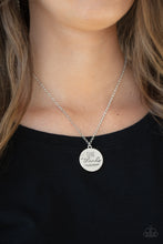 Load image into Gallery viewer, Infused with feathery accents, a shiny silver disc is stamped in the phrase, &quot;Give Thanks,&quot; at the bottom of a shimmery silver chain. Features an adjustable clasp closure.  Sold as one individual necklace. Includes one pair of matching earrings.
